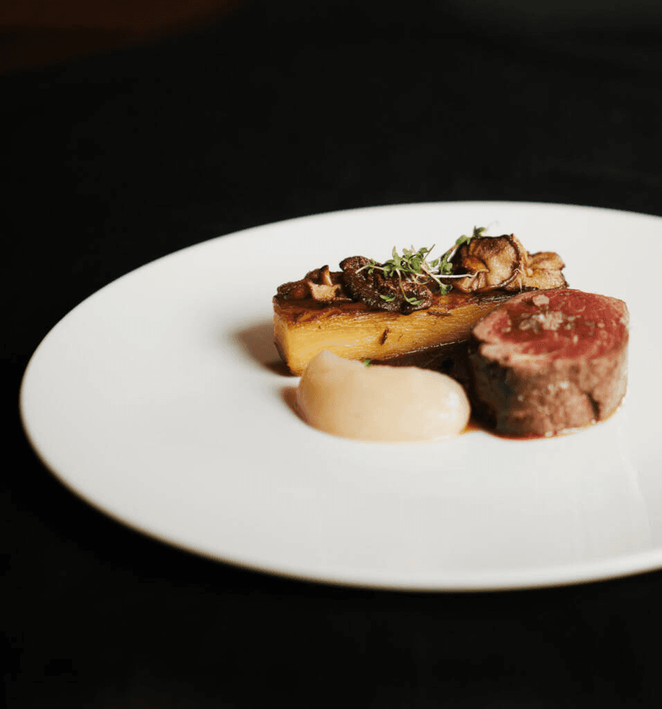 Plated beef tenderloin with mushrooms